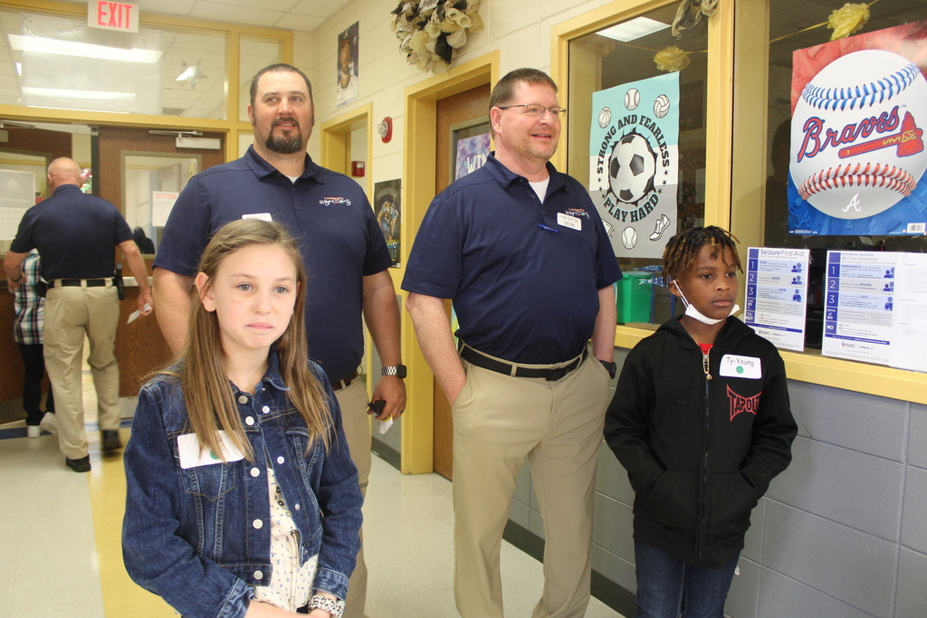 Leadership students lead guests on tour of school.