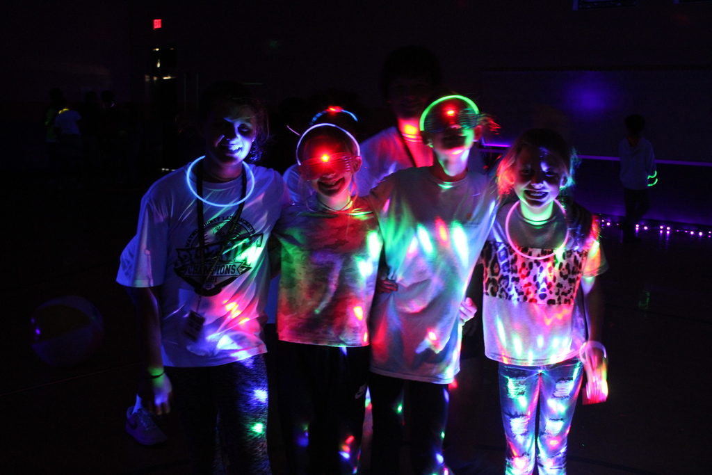 Students wearing glow in the dark items. 